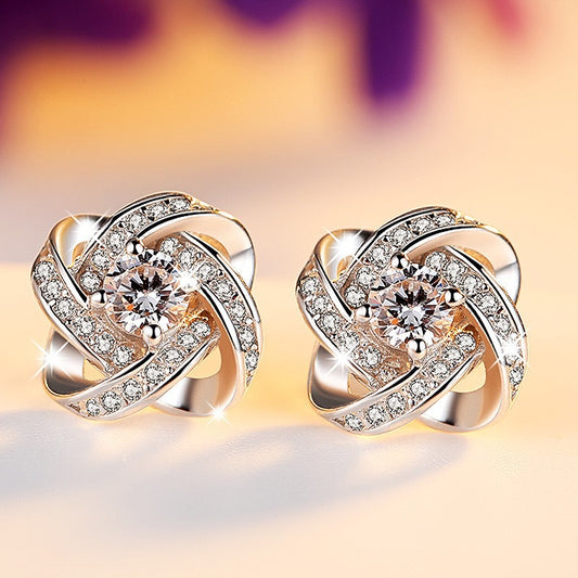 Silver Rotating Four-Leaf Clover Earrings