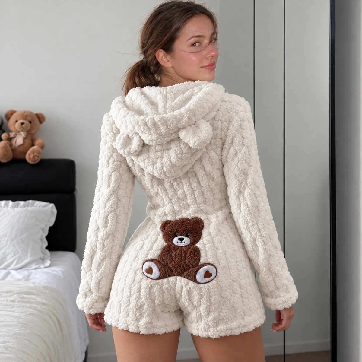 AI-assisted brand styling image showing Cozy Bear romper from the back